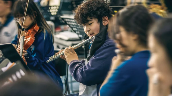 international school of qingdao middle school learning students at band practice