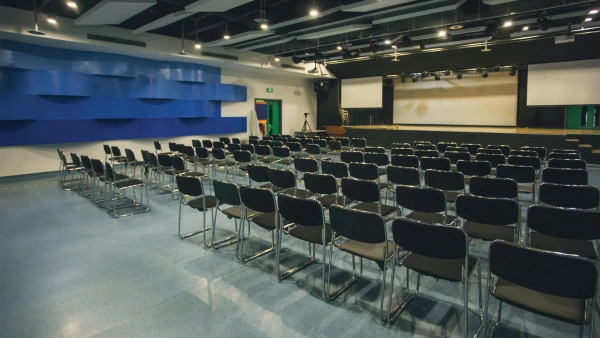 an empty international school of qingdao auditorium