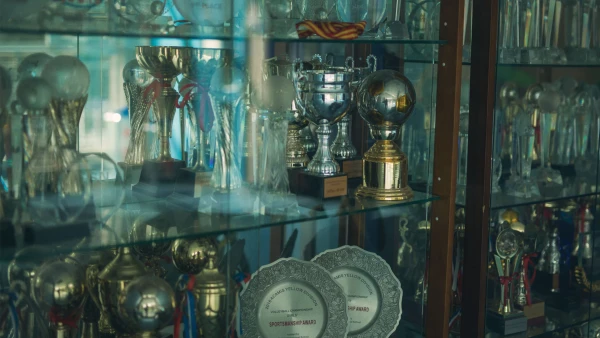 trophy case for international school of qingdao high school learning athletics and teamwork