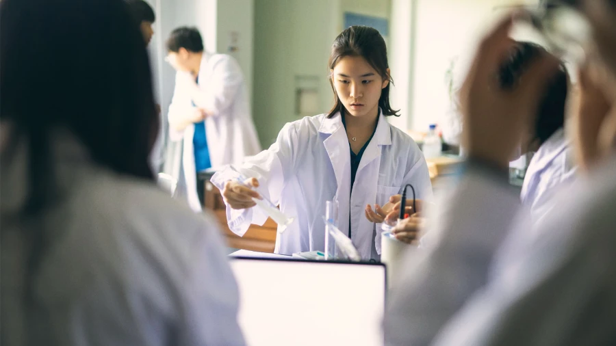 female student at international school of qingdao in the science lab